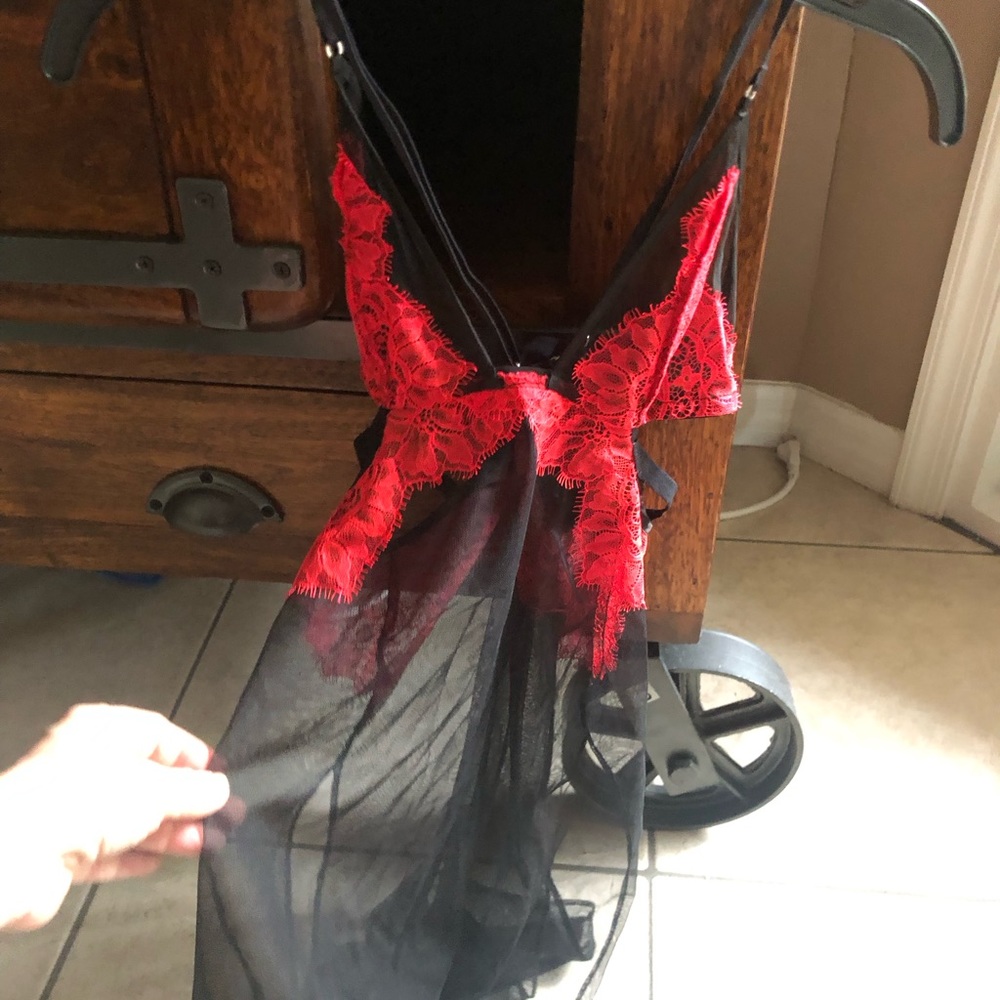 Victoria secret nightie. Practically new. Black and red.